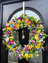 Bright explosion of colour in an extra large multicolour artificial spring wreath for front door.