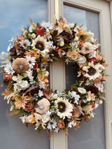 Side view of 60cm autumn wreath in creams and browns