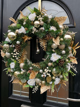 Large bespoke artificial Christmas wreath in gold and cream with baubles, glitter, roses, berries, pine and spruce,