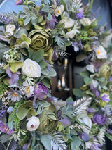 Large 60cm luxury artificial flower wreath in lavender, white, and green with ranunculus and hops accents.