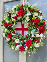 Side view of England flag wreath, extra large 60cm with faux red and white florals and foliage