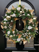 60cm artificial Christmas wreath in gold and cream with berries, leaves, pinecones, baubles and roses