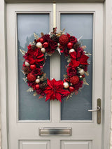 60cm luxury handmade artificial wreath in red and gold. Statement piece with extra large dimensions, poinsettias, baubles and roses