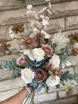 Exquisite luxury artificial flower arrangement in neutral mocha and cappuccino tones, showcasing tall, expanding blooms.