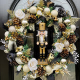 Black and gold artificial Christmas nutcracker wreath