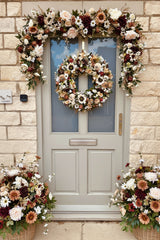 Full door view of luxury artificial cream artificial autumn wreath