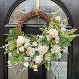 Luxury modern half wreath design featuring ivory roses and greenery, perfect for home decor.