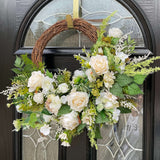 Luxury modern half wreath design featuring ivory and green flowers, perfect for year-round decor.