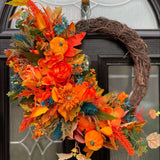 Luxury artificial bright orange and teal autumn pumpkin wreath