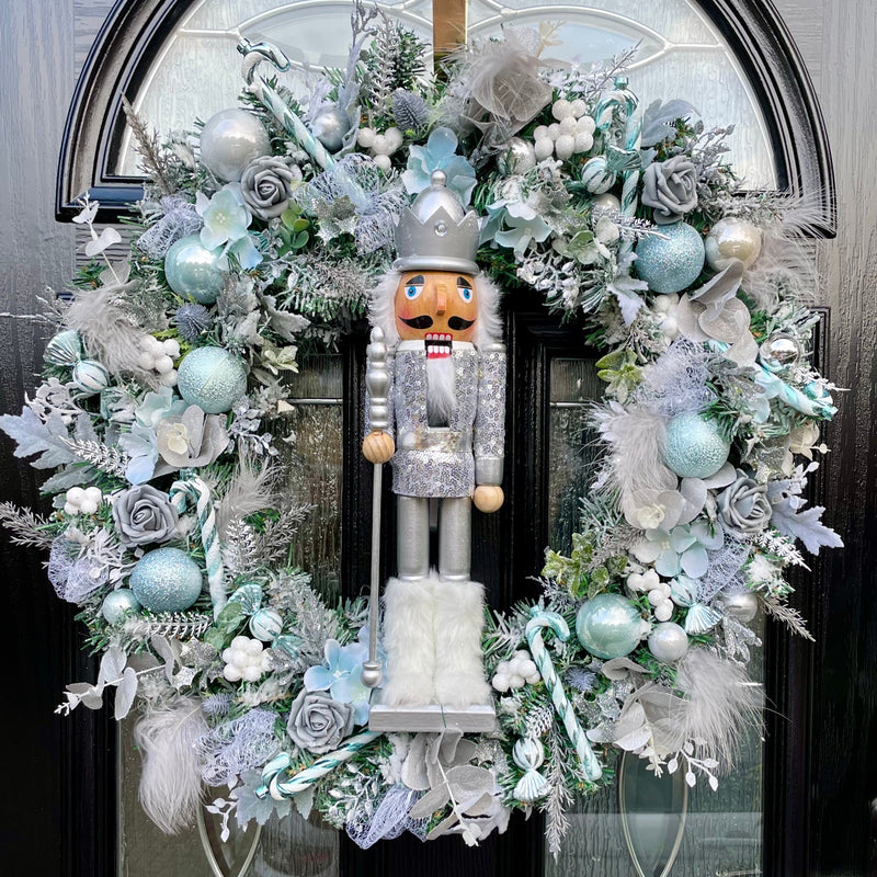 Large luxury ice blue and silver Christmas nutcracker wreath