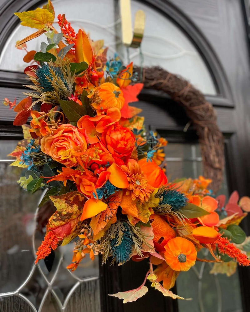 Luxury artificial bright orange and teal autumn pumpkin wreath