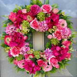 60cm large, Floral wreath with bright contrasting pink and green flowers