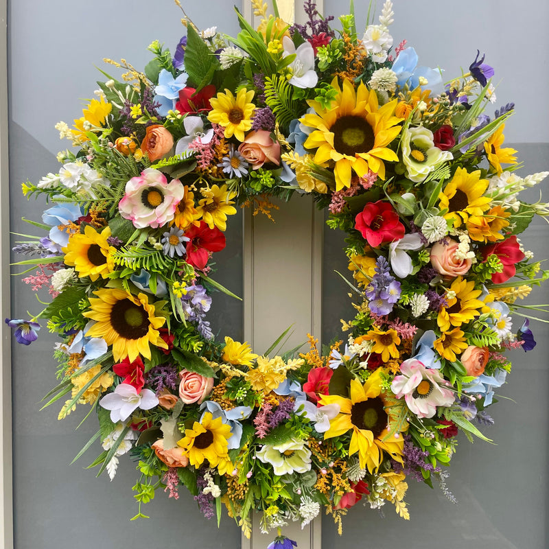 Extra large colourful artificial floral wreath with sunflowers