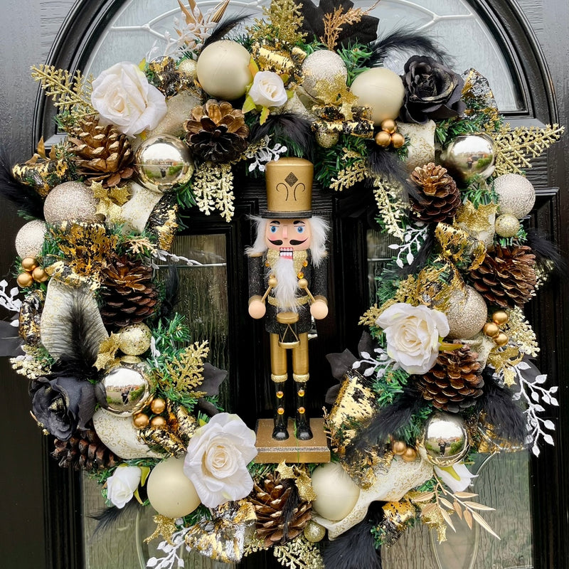 Black and gold artificial Christmas nutcracker wreath