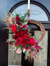 Rich red poinsettia Christmas half wreath