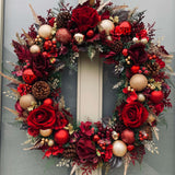 Designer red rose artificial Christmas wreath roses and baubles  — luxury door décor from Alana’s Floristry