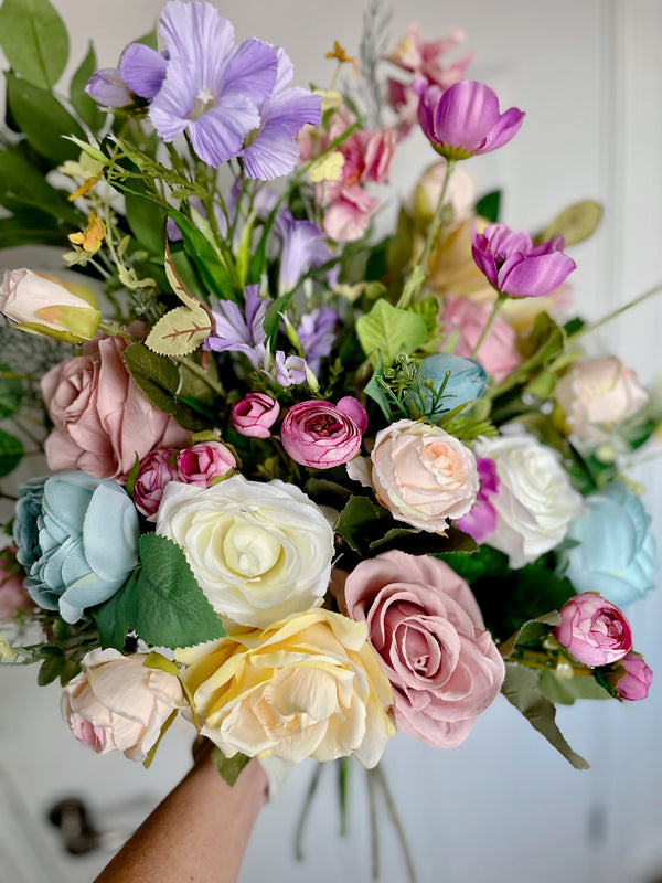 Luxury artificial pastel and bright floral arrangement bouquet