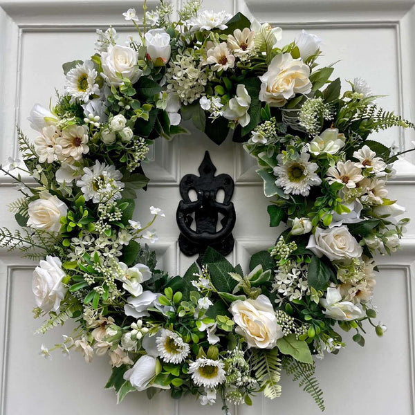 large ivory/ white and lush foliaage year round artificial wreath with roses