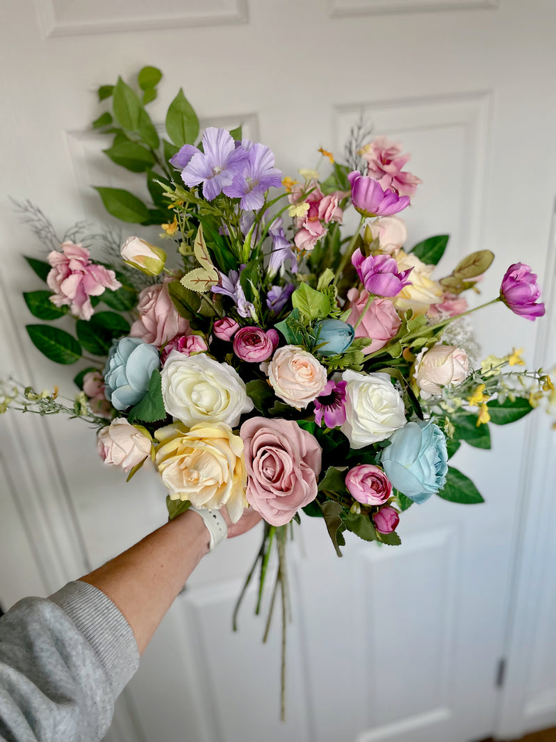 Luxury artificial pastel and bright floral arrangement bouquet